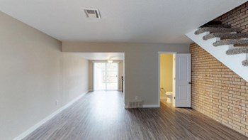 Image of large room with vinyl plank flooring